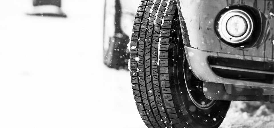 /author/bynder-asset/bynder:A18882D8-4B56-4AAD-A5B8FEC77C645B74/Landscape_LG/SINGLE-IMAGE_car-tires-on-winter-road_may24.jpg?1749636772000