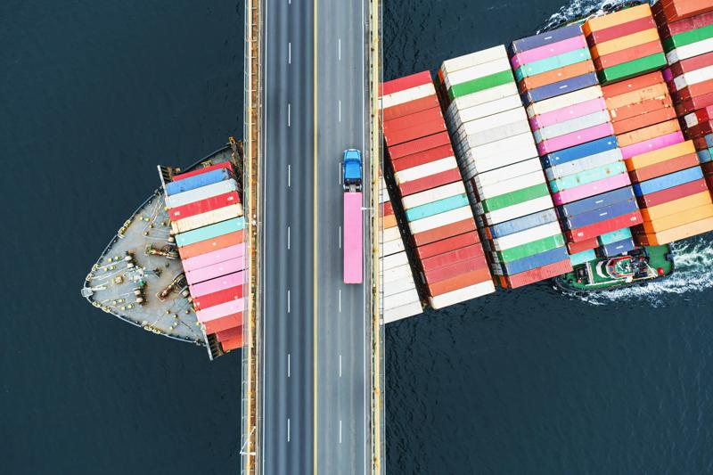 COLOUR-IMAGE_cargo-ship-and-truck_feb26