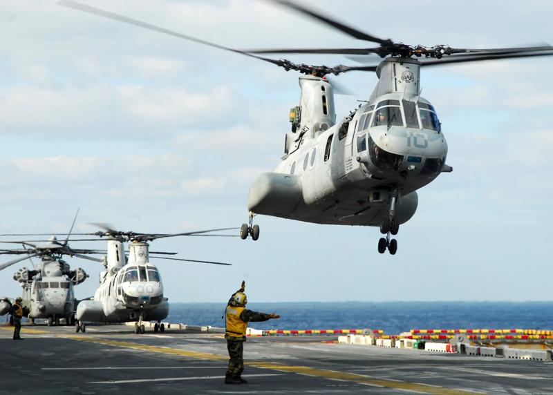 COLOUR-IMAGE_aerospace&defence-militray-helicopters-taking-off-from-aircraft-carrier_feb26