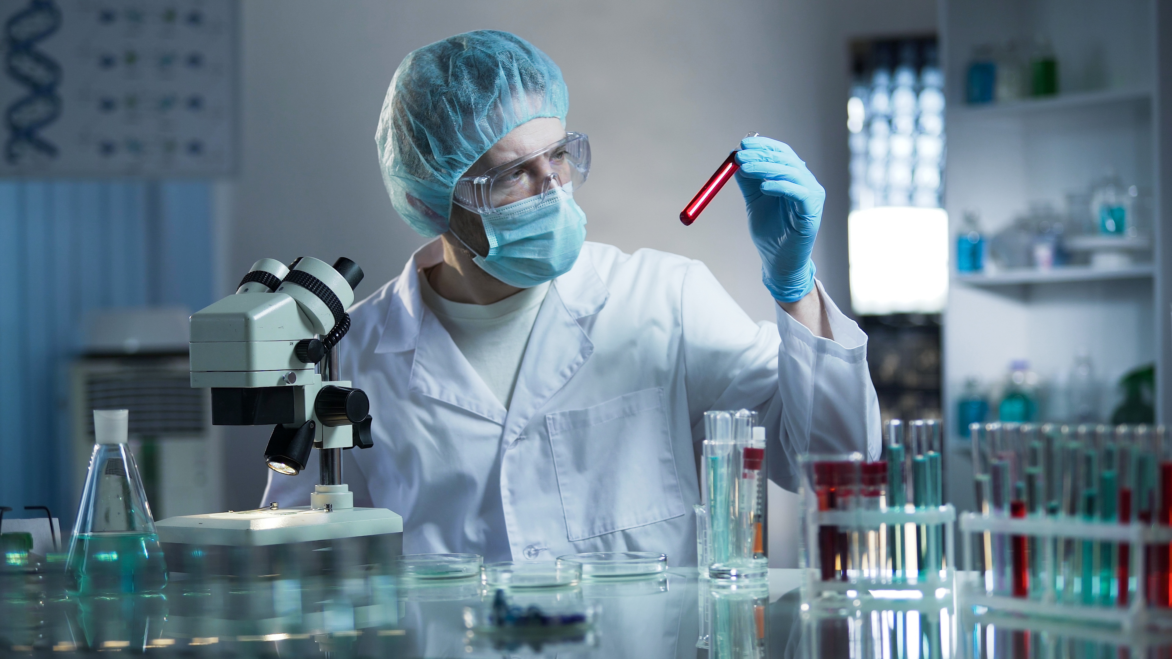 COLOUR-IMAGE_life-science-laboratory-worker-studying-blood-samples-pathologies_feb26
