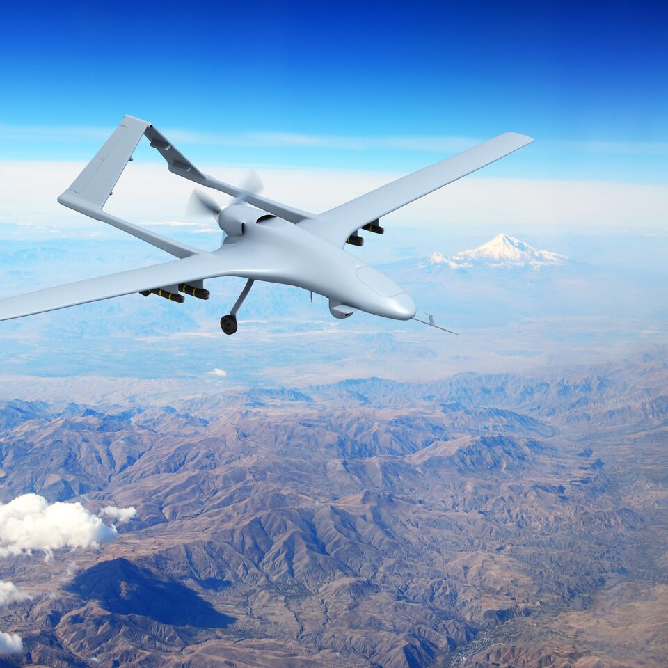 COLOUR-IMAGE_aerospace&defence-drone-flying-over-mountains_feb26